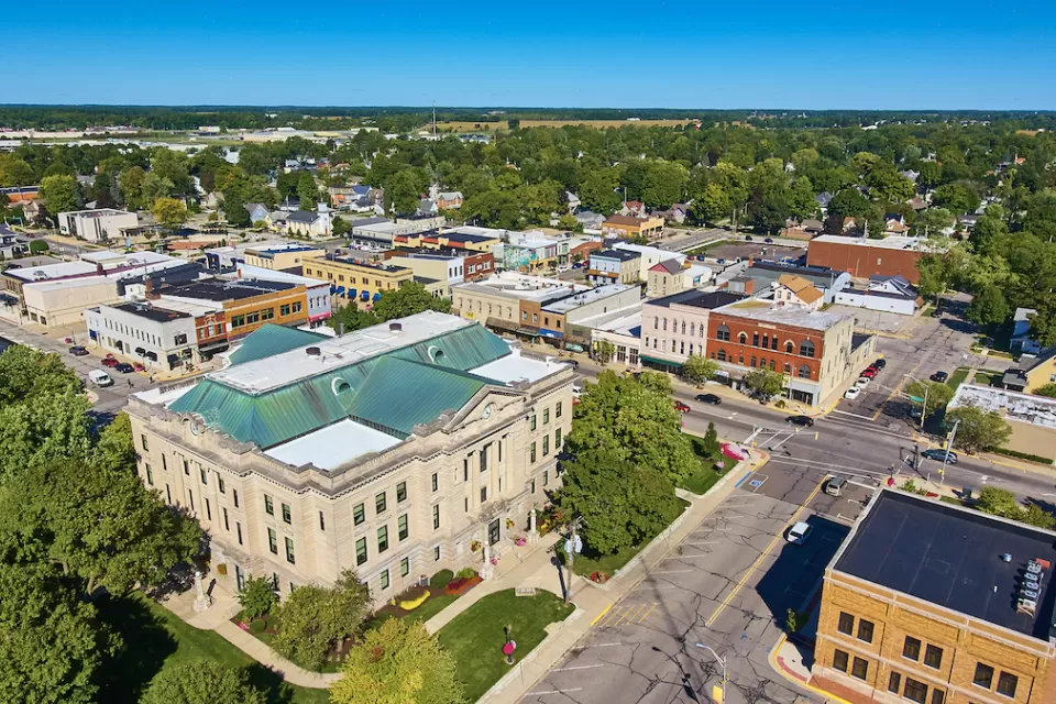 Aerial view of downtown Auburn, Indiana on a clear, sunny day.